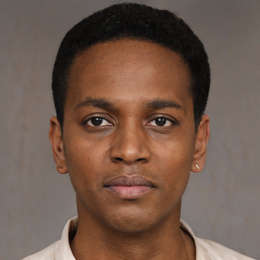 Neutral black young-adult male with short  black hair and brown eyes