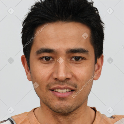 Joyful asian young-adult male with short  black hair and brown eyes