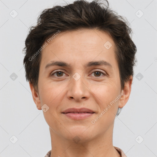 Joyful white adult female with short  brown hair and brown eyes