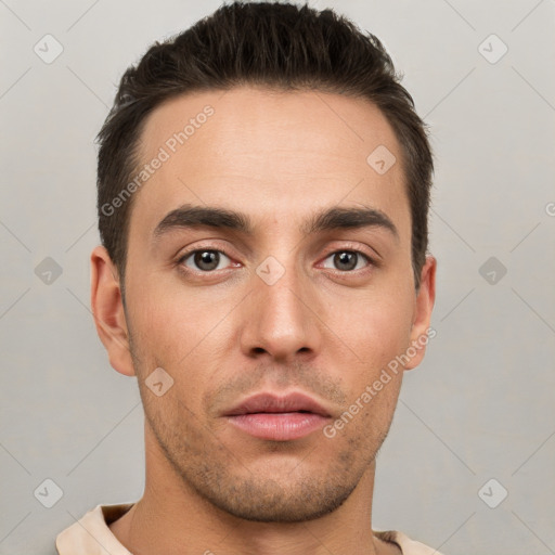 Neutral white young-adult male with short  brown hair and brown eyes