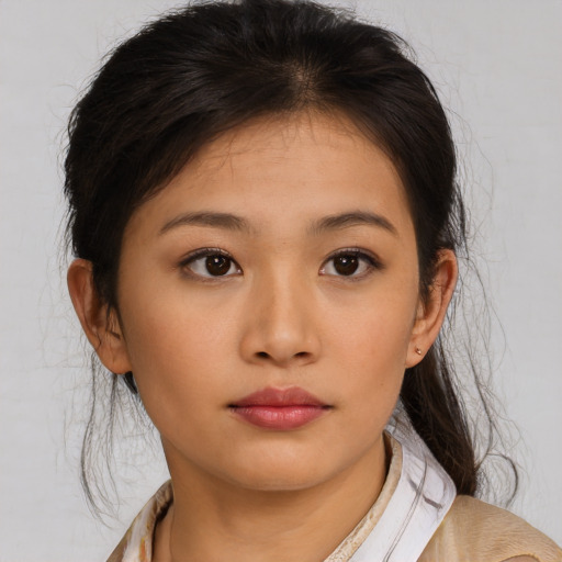 Neutral latino young-adult female with medium  brown hair and brown eyes