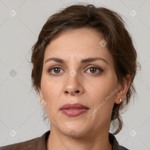 Neutral white young-adult female with medium  brown hair and brown eyes