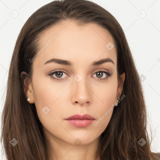 Neutral white young-adult female with long  brown hair and brown eyes