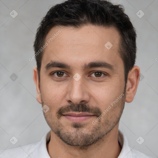 Joyful white young-adult male with short  brown hair and brown eyes