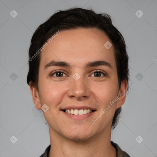 Joyful white young-adult female with short  brown hair and brown eyes