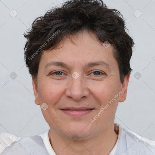 Joyful white adult female with short  brown hair and brown eyes