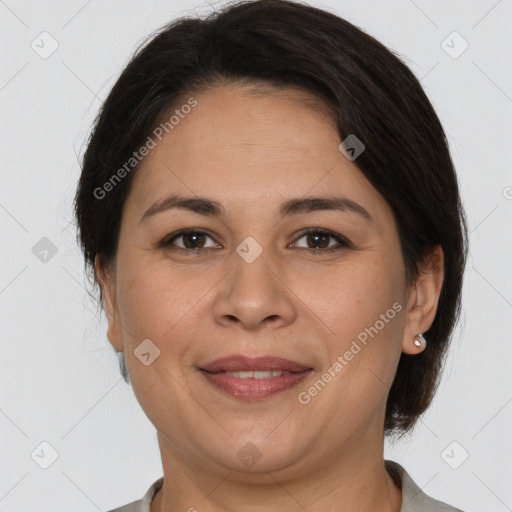 Joyful white adult female with medium  brown hair and brown eyes