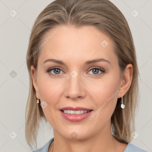 Joyful white young-adult female with medium  brown hair and grey eyes