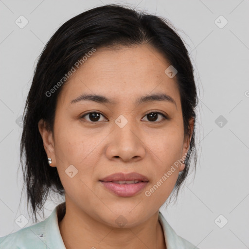 Joyful asian young-adult female with medium  brown hair and brown eyes