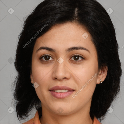 Joyful latino young-adult female with medium  brown hair and brown eyes