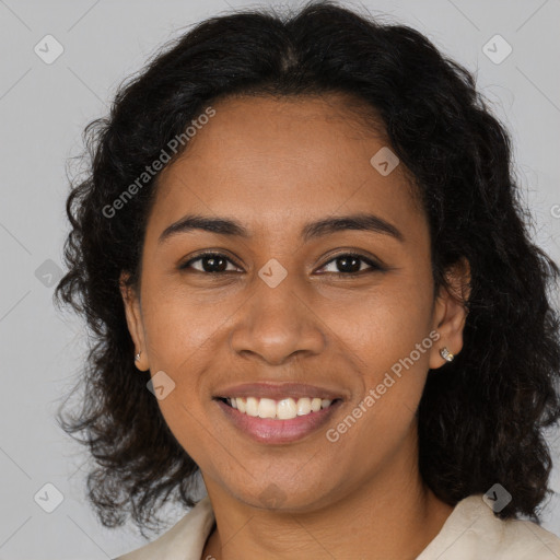 Joyful black young-adult female with medium  brown hair and brown eyes