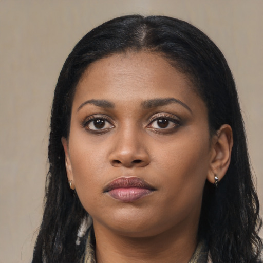 Neutral black young-adult female with long  black hair and brown eyes