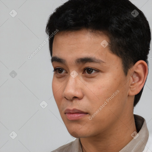 Neutral latino young-adult male with short  black hair and brown eyes