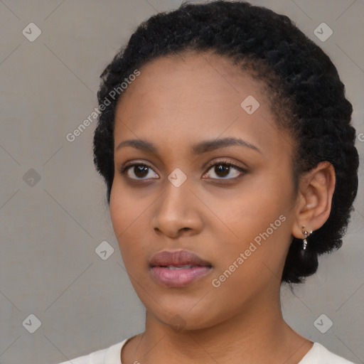 Neutral black young-adult female with short  black hair and brown eyes