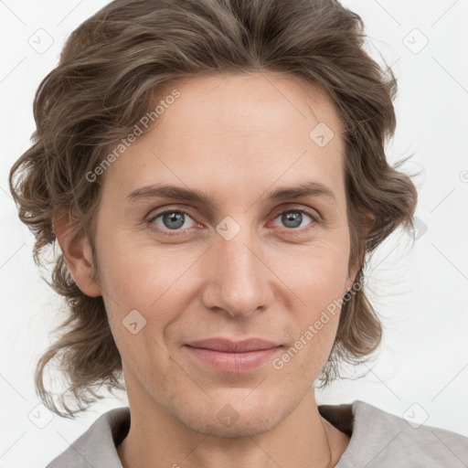 Joyful white young-adult female with medium  brown hair and blue eyes