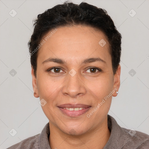 Joyful white adult female with short  brown hair and brown eyes