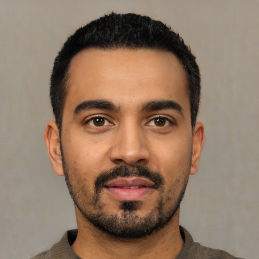 Neutral latino young-adult male with short  black hair and brown eyes