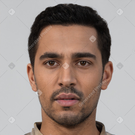 Neutral latino young-adult male with short  black hair and brown eyes