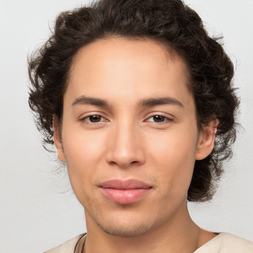 Joyful white young-adult male with medium  brown hair and brown eyes