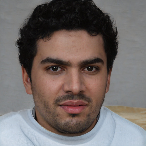 Neutral white young-adult male with short  black hair and brown eyes