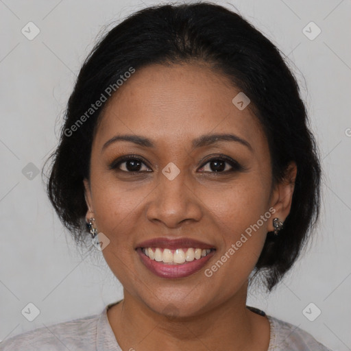 Joyful black young-adult female with medium  black hair and brown eyes