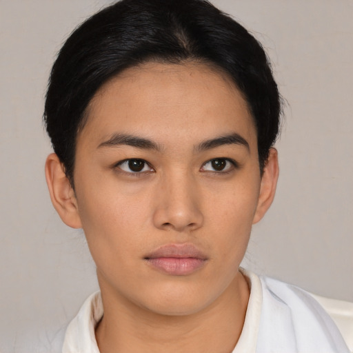Neutral asian young-adult female with short  black hair and brown eyes
