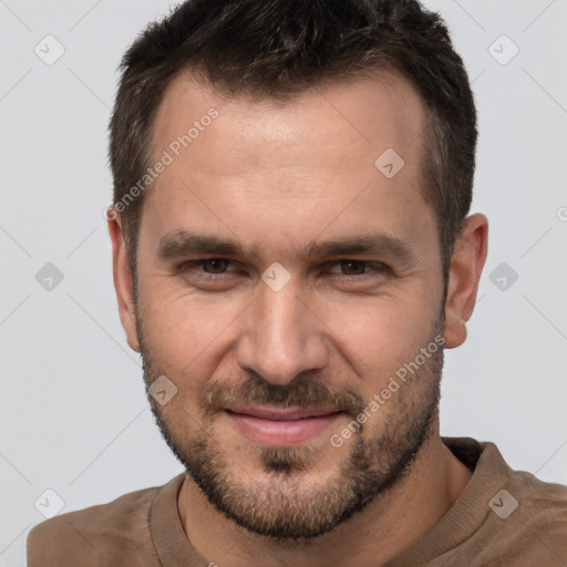 Joyful white adult male with short  brown hair and brown eyes