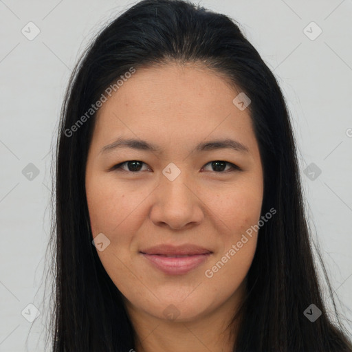 Joyful asian young-adult female with long  brown hair and brown eyes