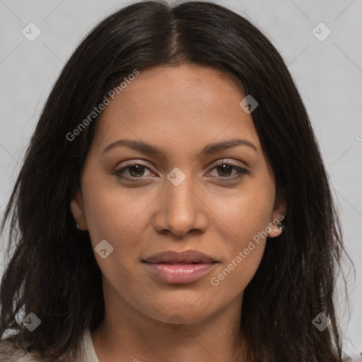 Joyful latino young-adult female with long  brown hair and brown eyes