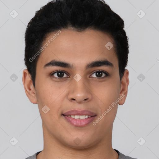 Joyful latino young-adult male with short  black hair and brown eyes