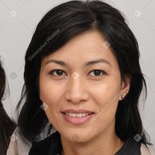 Joyful white adult female with medium  brown hair and brown eyes