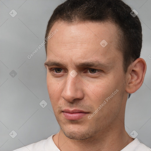 Neutral white adult male with short  brown hair and brown eyes