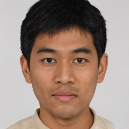 Neutral asian young-adult male with short  brown hair and brown eyes