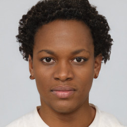 Neutral black young-adult female with short  brown hair and brown eyes