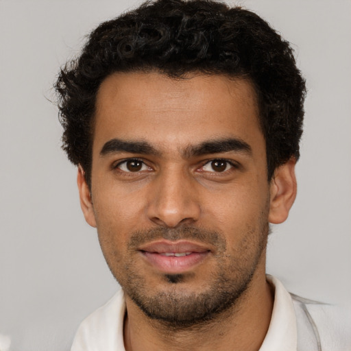 Neutral white young-adult male with short  black hair and brown eyes