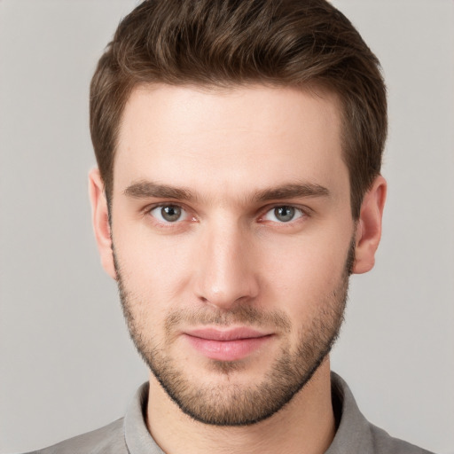 Neutral white young-adult male with short  brown hair and grey eyes