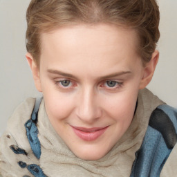 Joyful white young-adult female with medium  brown hair and blue eyes