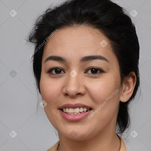 Joyful latino young-adult female with medium  brown hair and brown eyes