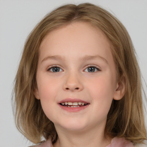 Joyful white child female with medium  brown hair and grey eyes