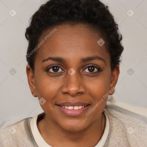 Joyful black young-adult female with short  brown hair and brown eyes