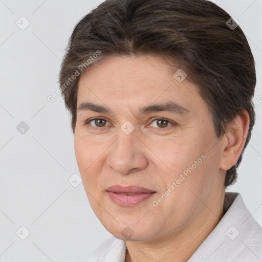 Joyful white adult female with short  brown hair and brown eyes