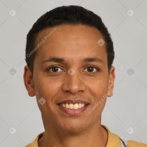 Joyful latino young-adult male with short  brown hair and brown eyes