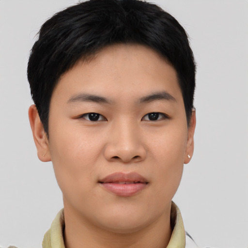 Joyful asian young-adult female with short  black hair and brown eyes