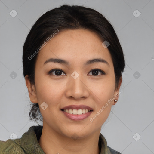 Joyful asian young-adult female with medium  brown hair and brown eyes