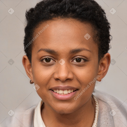 Joyful black young-adult female with short  brown hair and brown eyes