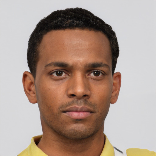 Neutral black young-adult male with short  black hair and brown eyes