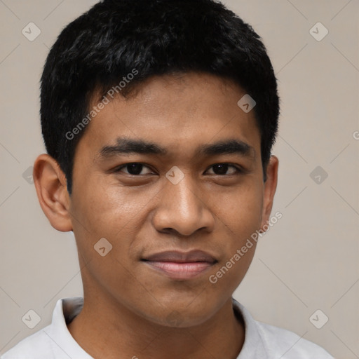 Joyful asian young-adult male with short  black hair and brown eyes