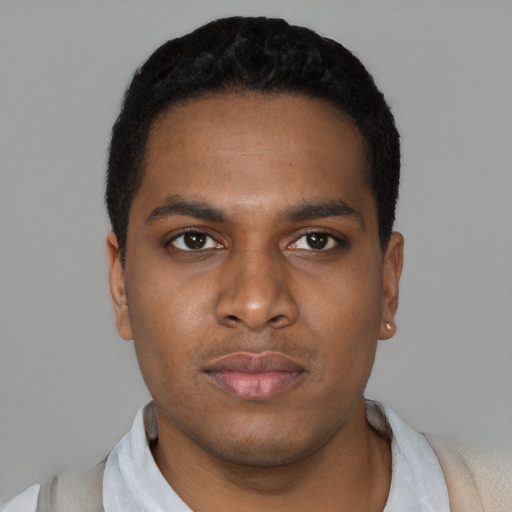 Neutral latino young-adult male with short  black hair and brown eyes