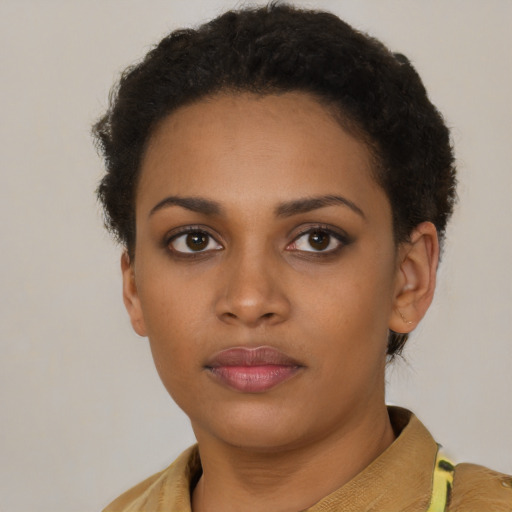 Neutral black young-adult female with short  brown hair and brown eyes