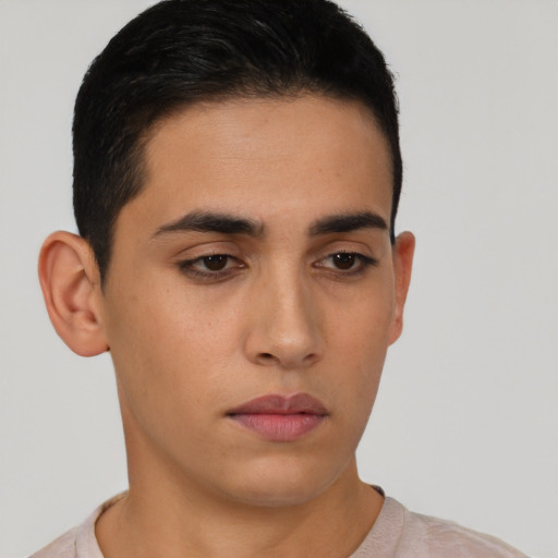 Neutral latino young-adult male with short  black hair and brown eyes